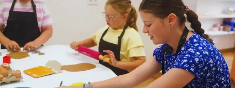 enfant réalisant des sablés pendant un atelier patisserie - studio macarons
